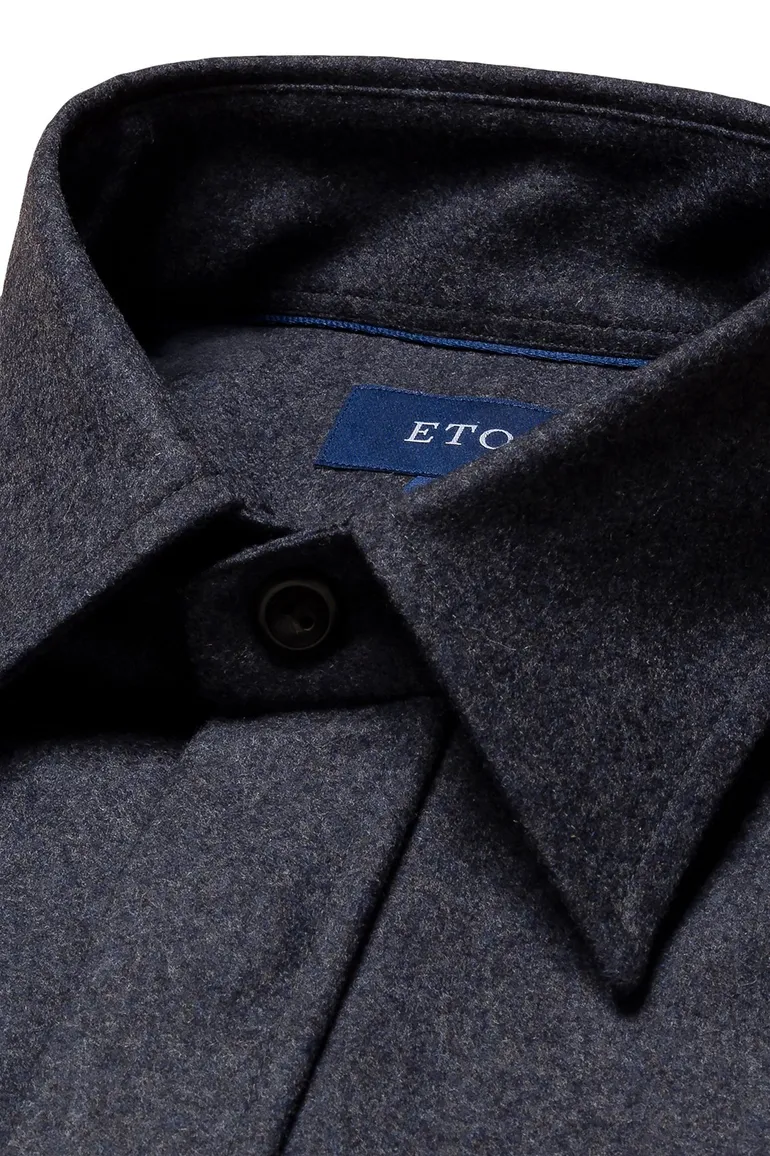 Eton vest opstaande kraag donkerblauw knopen effen