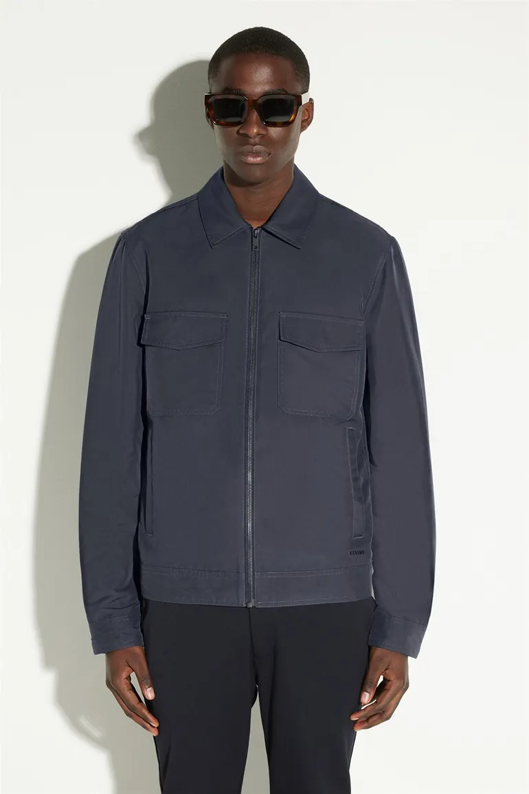 Elvine zomerjas donkerblauw effen rits normale fit twee borstzakken