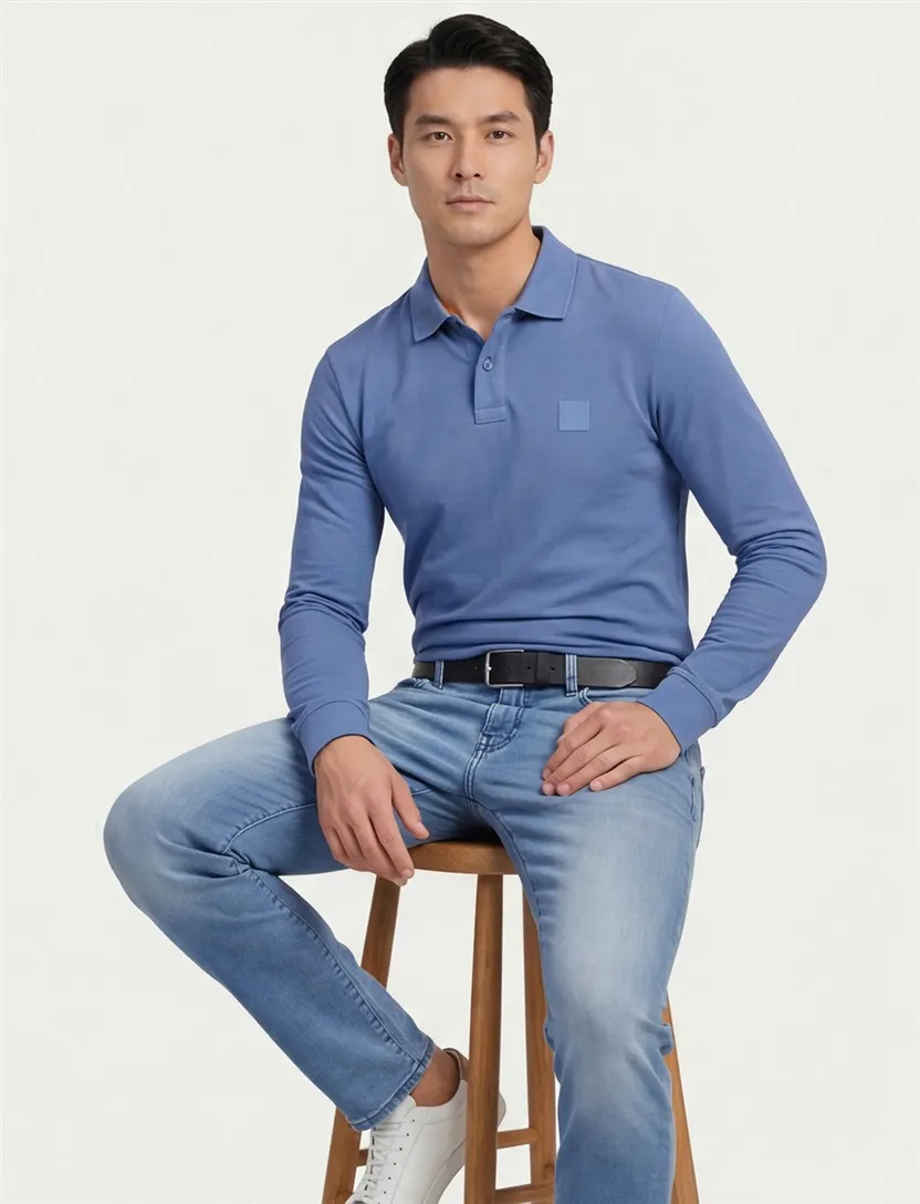 lichtblauwe Hugo Boss Orange Passerby polo lange mouw
