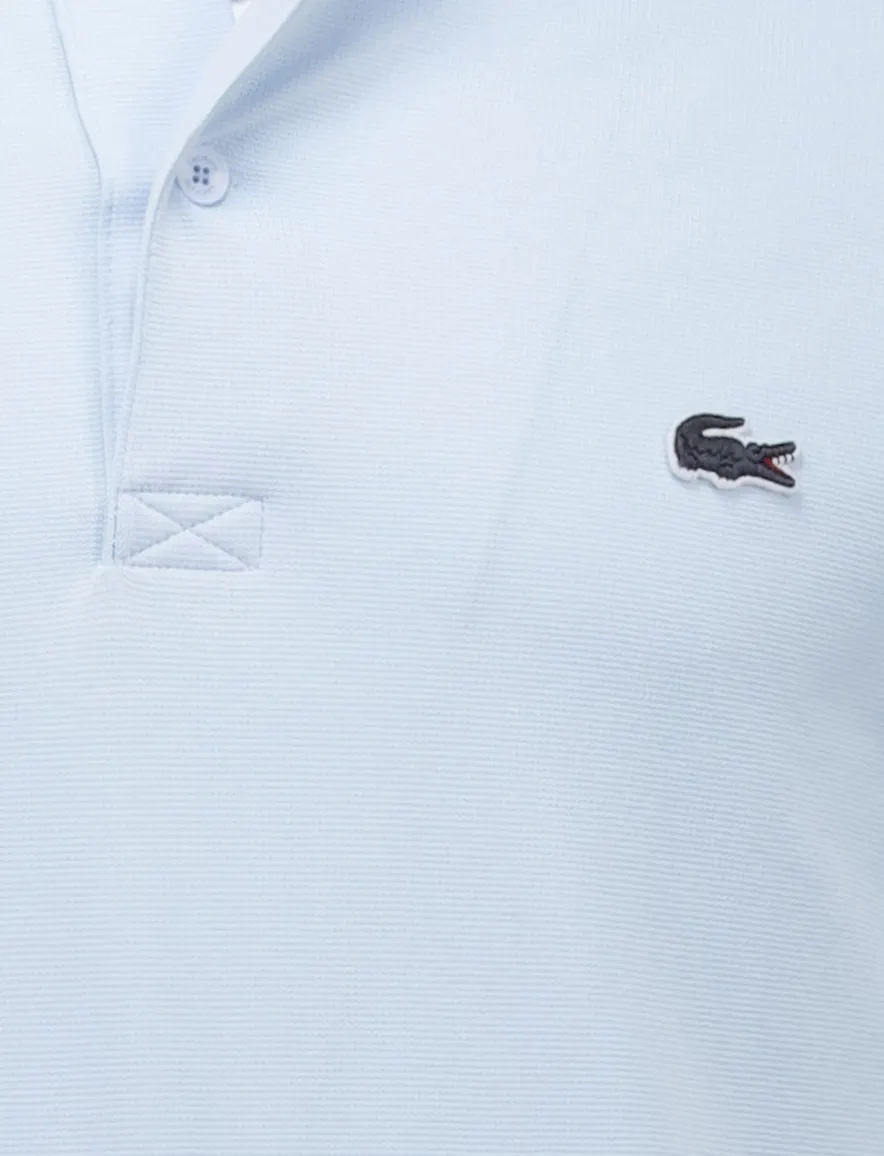 Lacoste polo lichtblauw effen pique 2-knoops