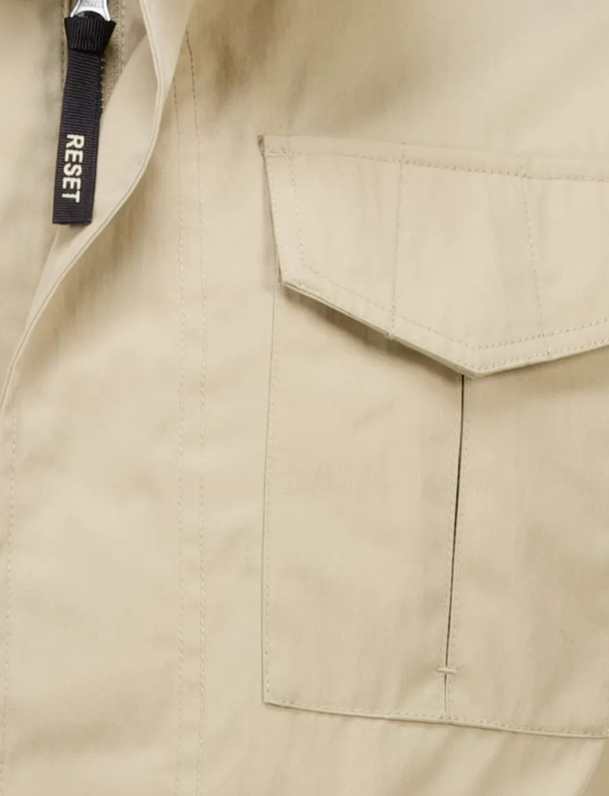 Reset tussenjas beige