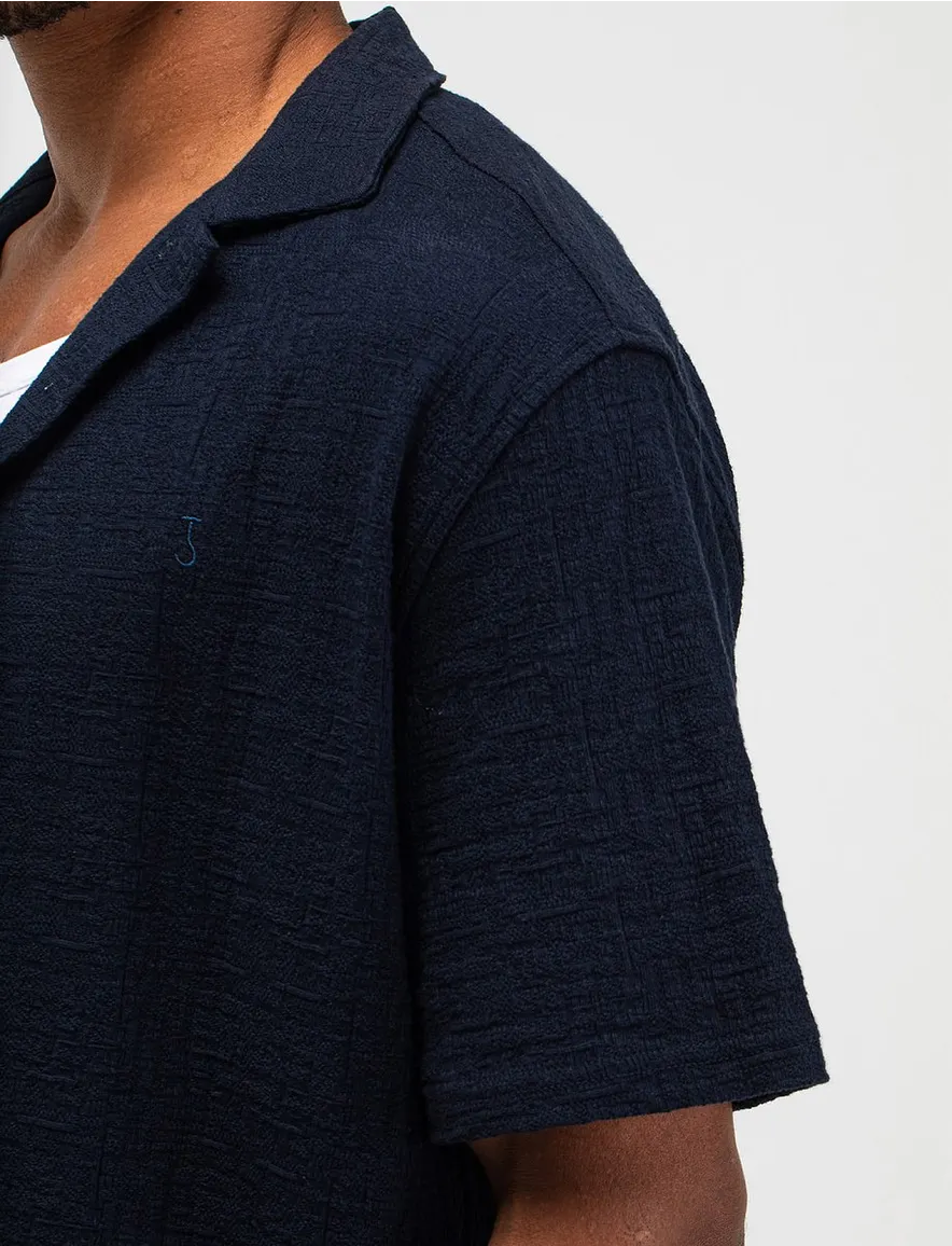 Butcher of Blue polo donkerblauw doorknoop deel van set