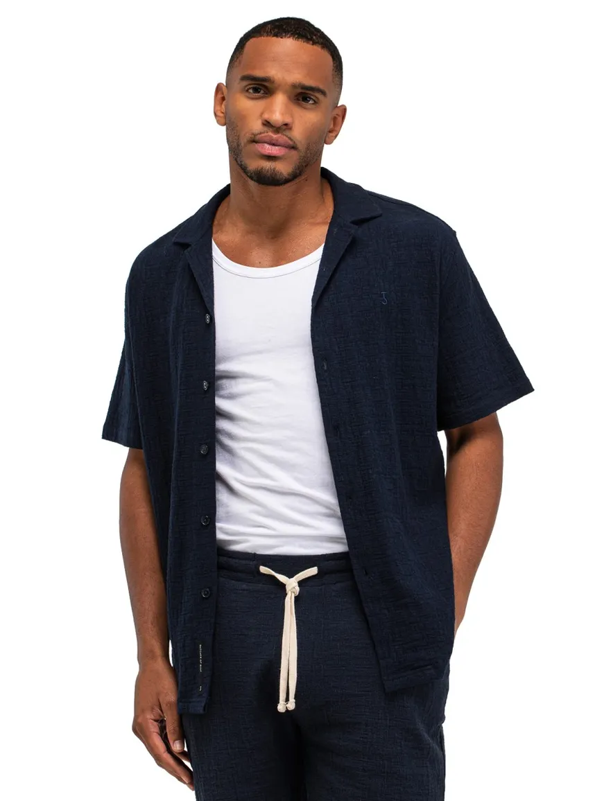 Butcher of Blue doorknoop polo donkerblauw deel van set