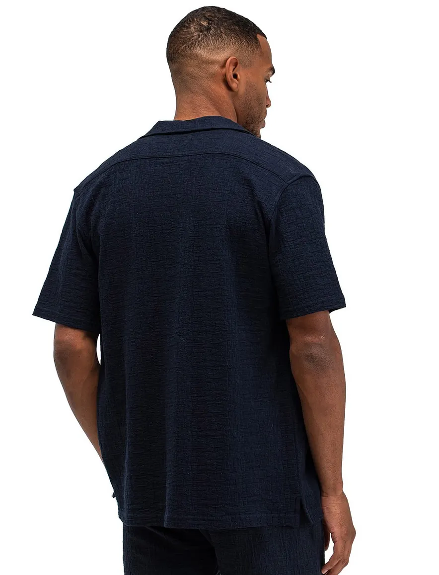 Butcher of Blue polo donkerblauw doorknoop deel van set