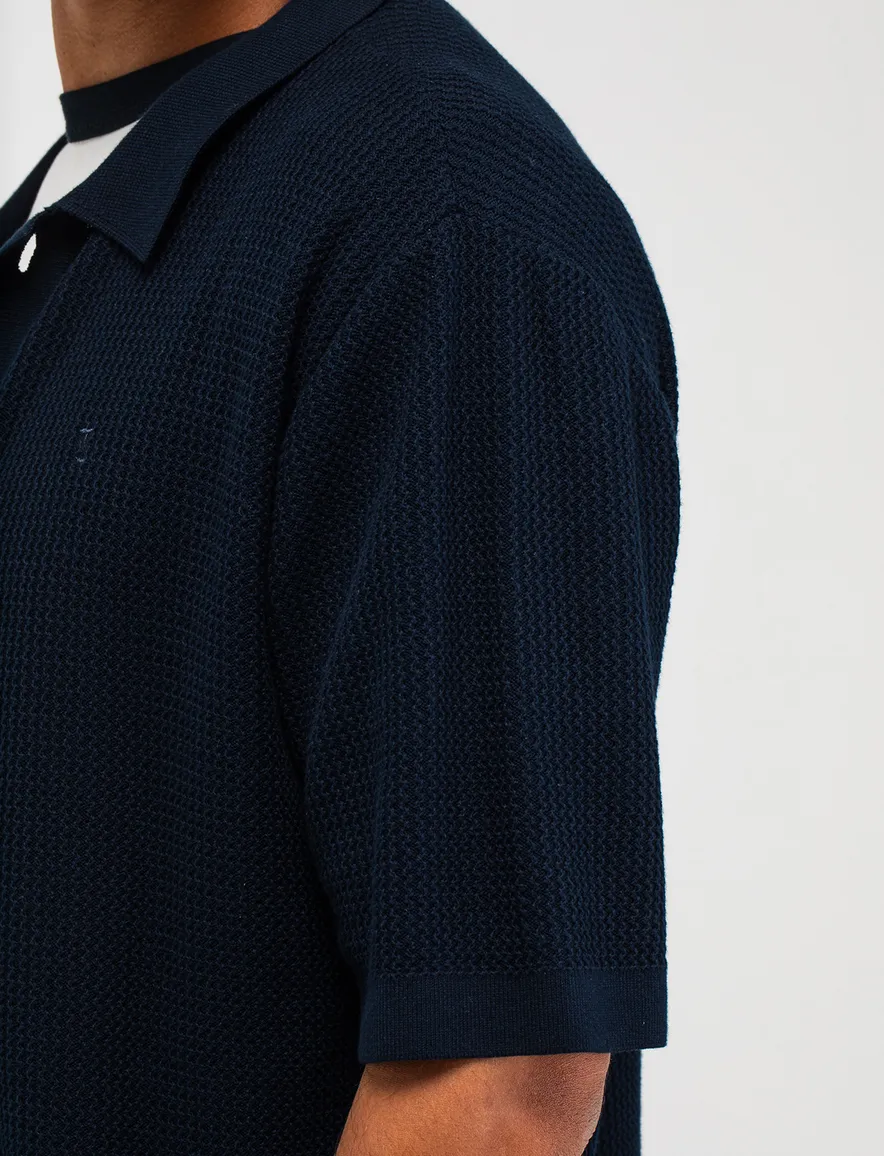 Butcher of Blue polo doorknoop donkerblauw korte mouw gebreid