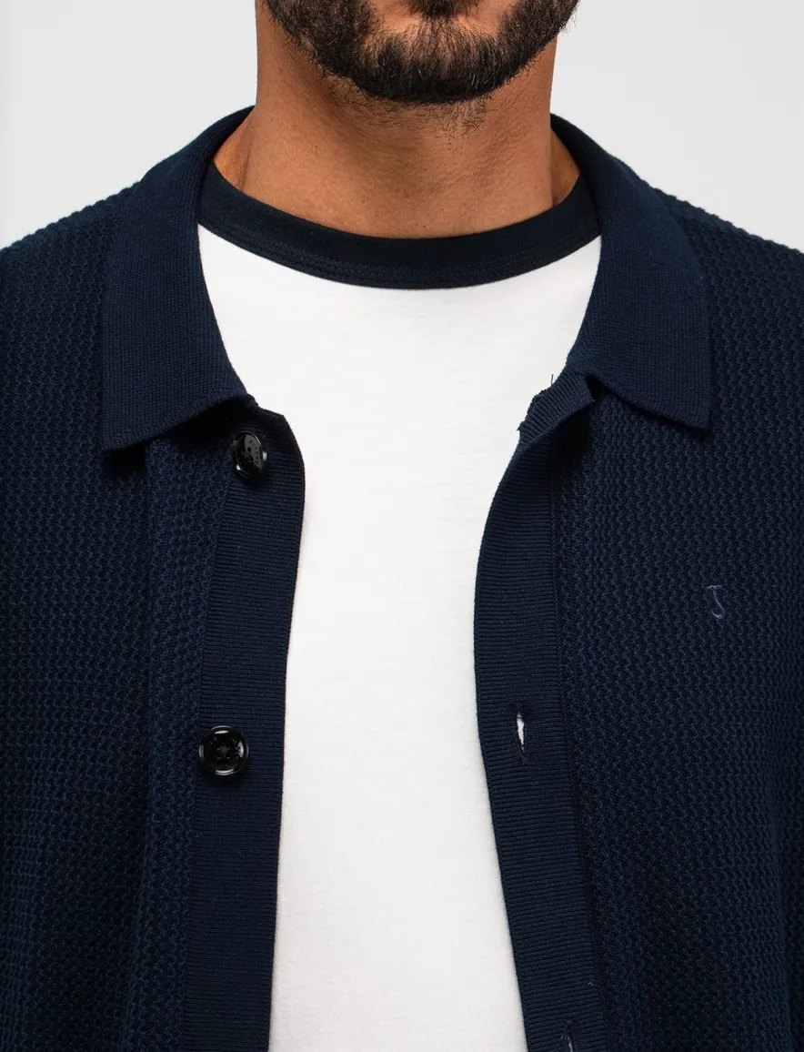 Butcher of Blue polo doorknoop donkerblauw korte mouw gebreid