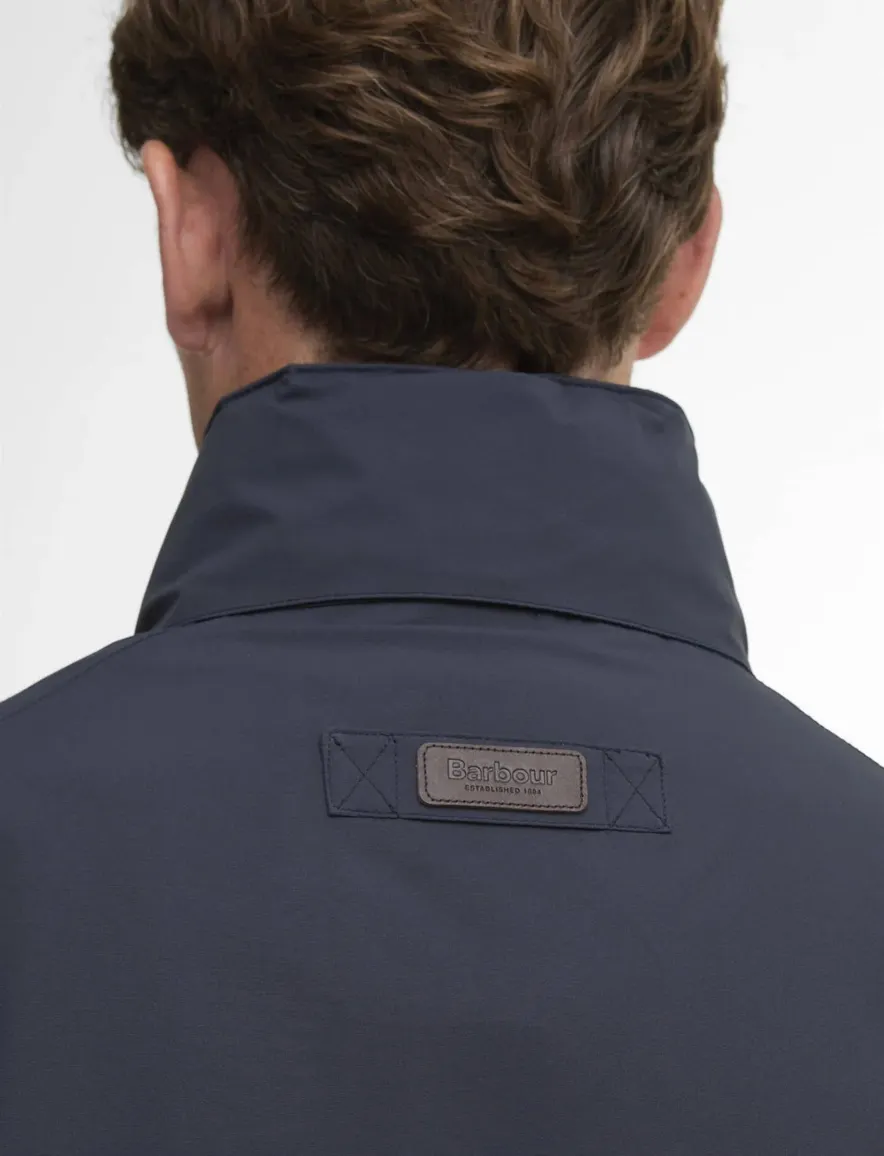 donkerblauwe Barbour zomerjas rits en knopen