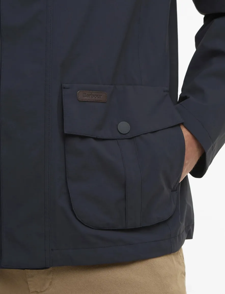 donkerblauwe Barbour zomerjas rits en knopen