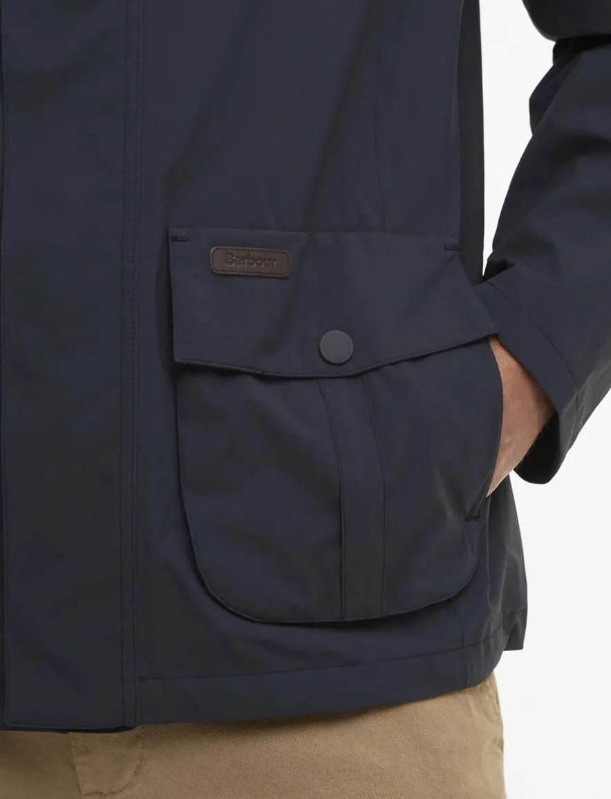 donkerblauwe Barbour zomerjas rits en knopen