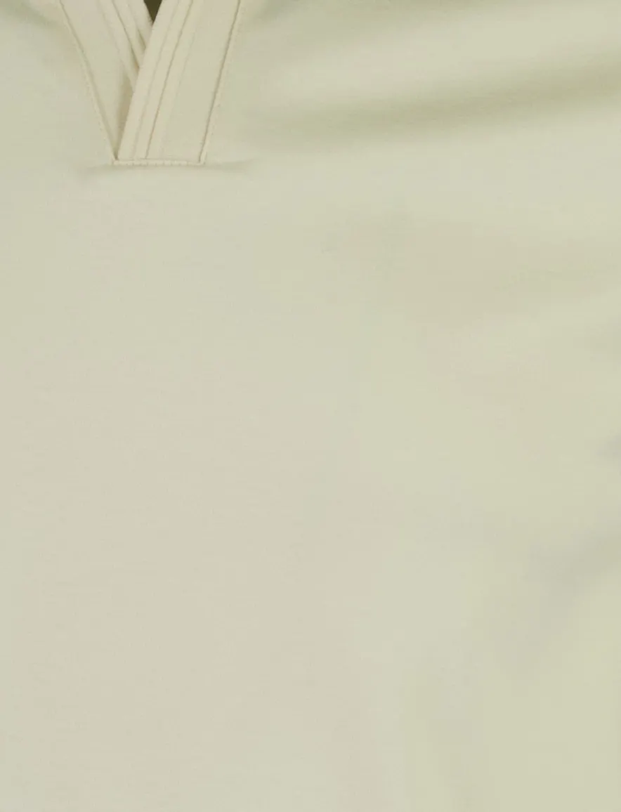 Poloshirt Tommy Hilfiger creme Wijde Fit