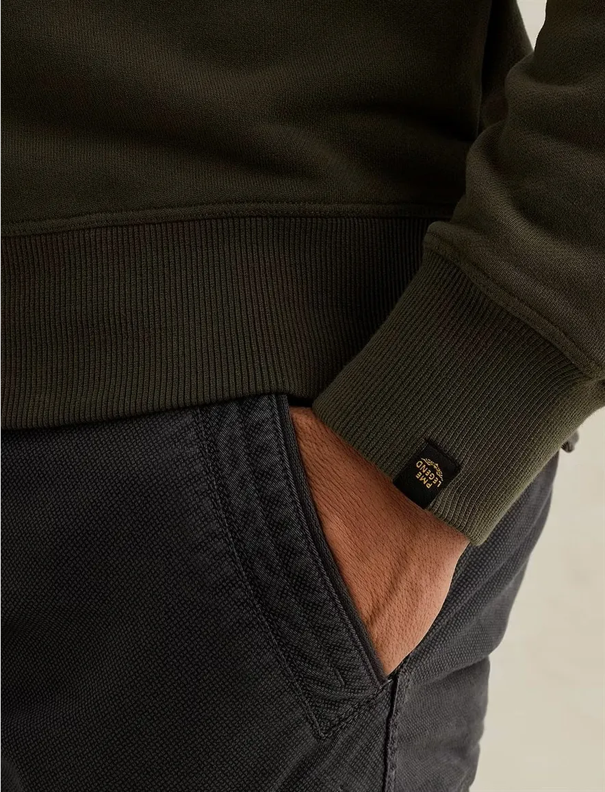Donkergroene sweater PME Legend embleempjes