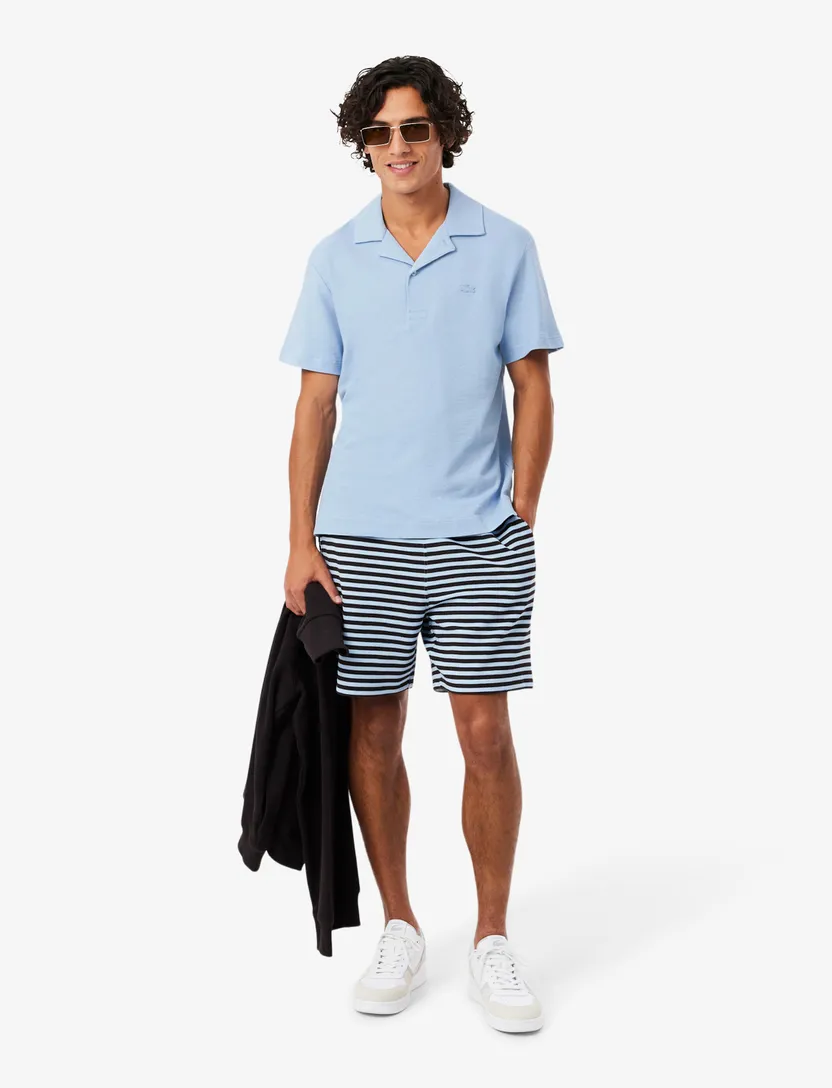 Polo Lacoste lichtblauw normale fit 2 knoopjes