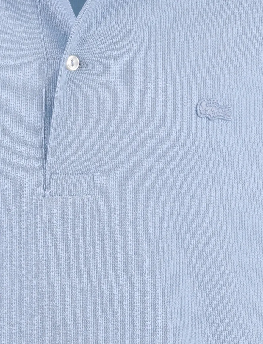 Lichtblauwe polo Lacoste 2 knoops