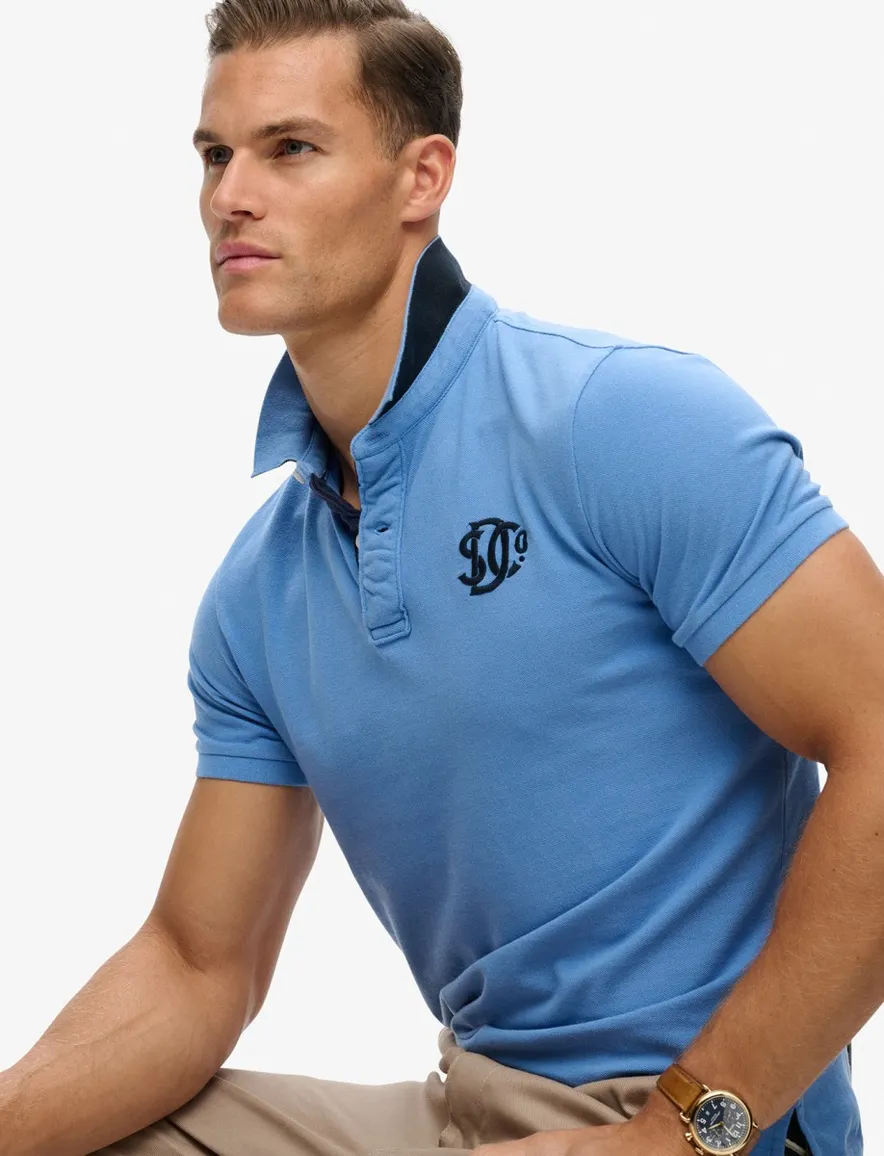 Superdry polo lichtblauw logo borst