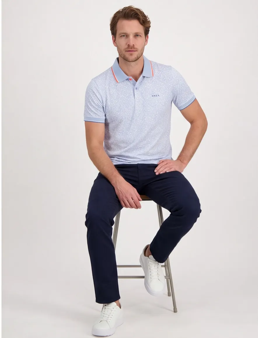 Poloshirt New Zealand lichtblauw met blaadjesprint