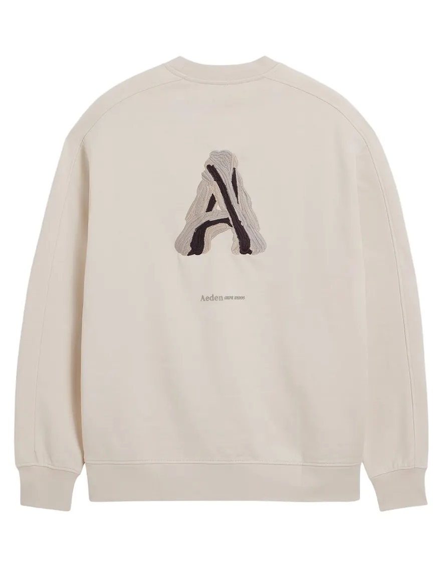 Aeden trui creme backprint oversized