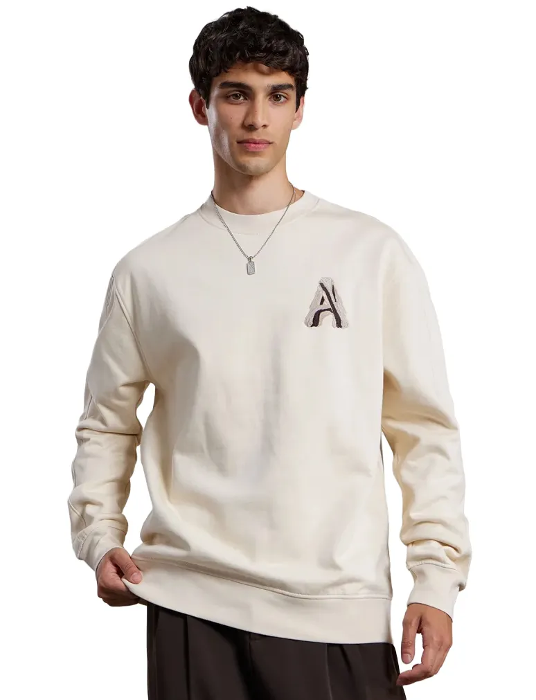 Trui Aeden creme oversized