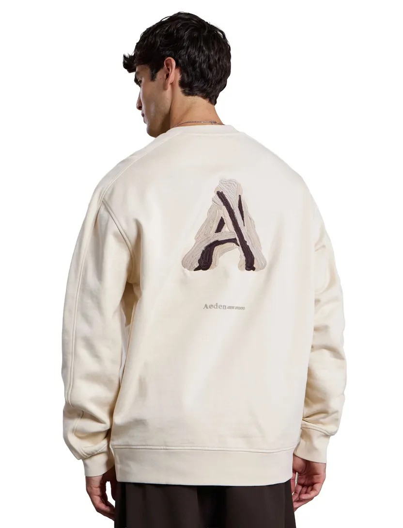 Trui Aeden creme oversized