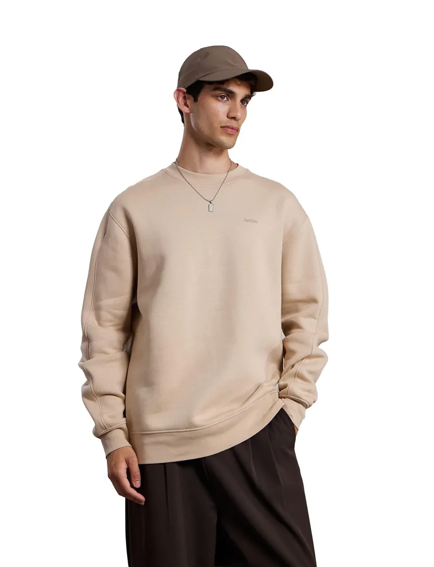 Beige trui Aeden backprint
