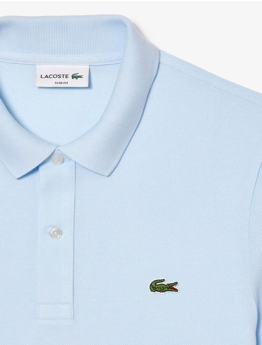 polo Lacoste lichtblauw effen katoen wijde fit