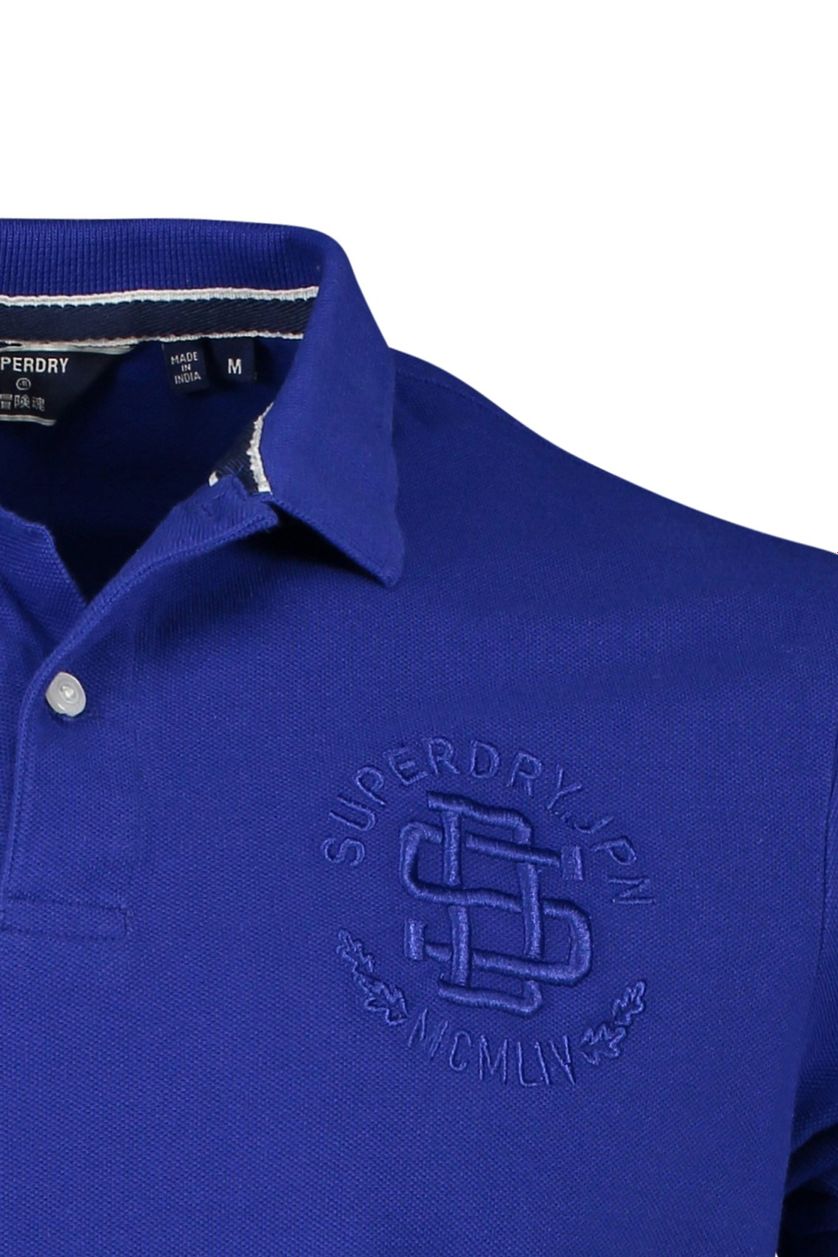 Blauw witte polo Superdry logo