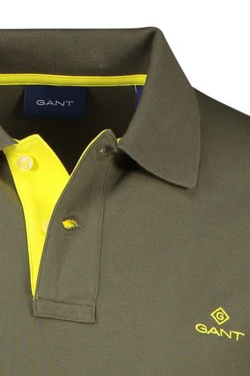 Gant polo donker groen effen 2-knoops geel logo