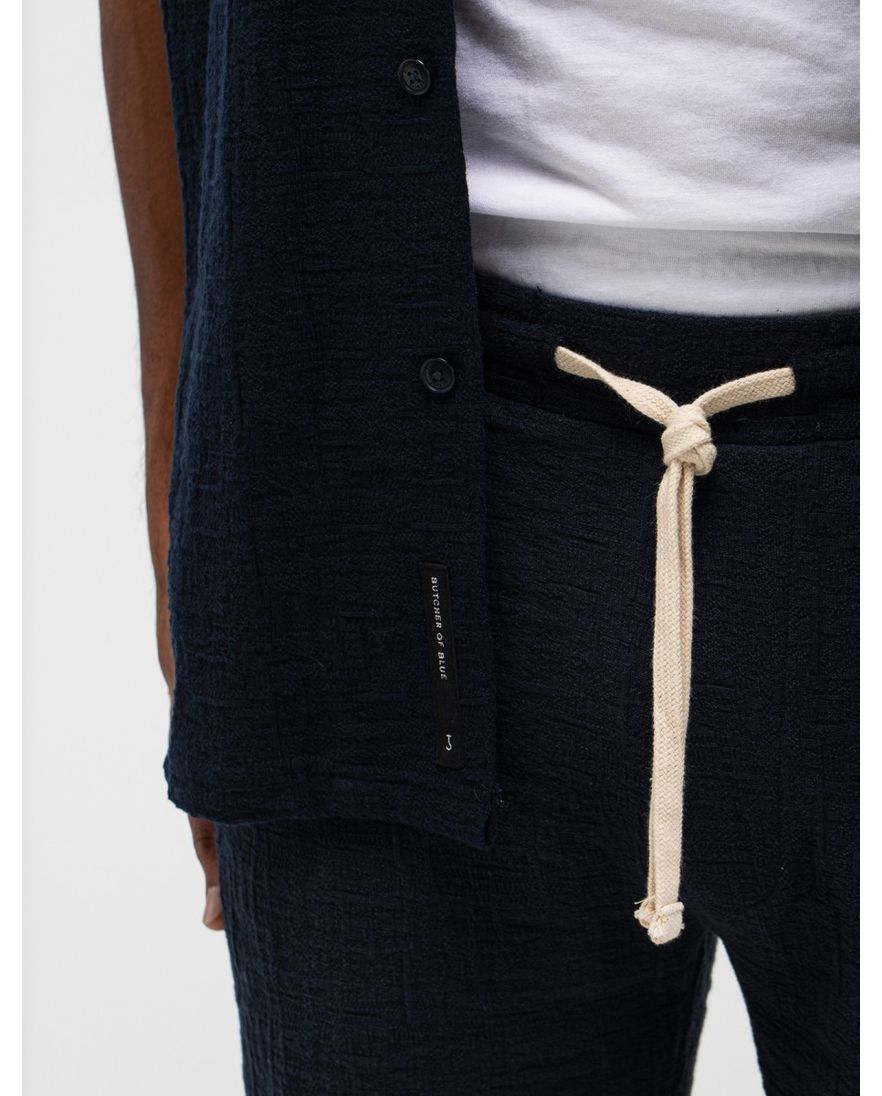 Donkerblauwe doorknoop polo Butcher of Blue deel van set