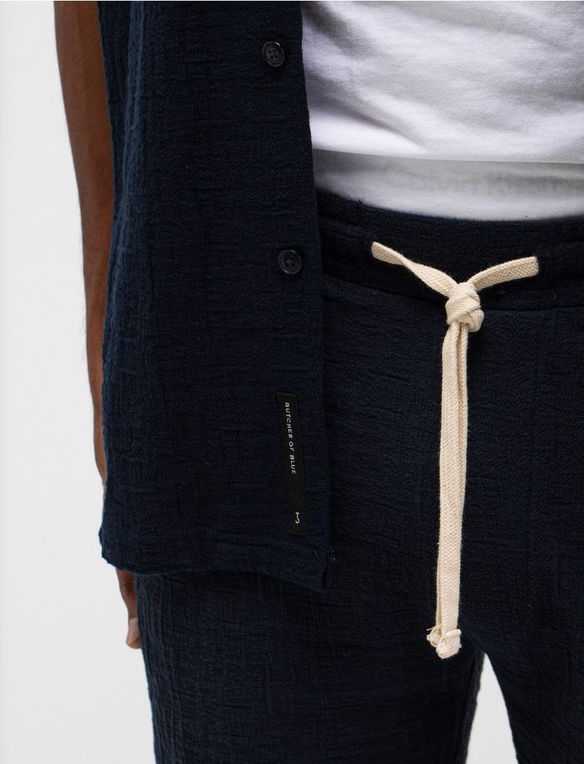 Doorknoop polo Butcher of Blue donkerblauw structuur deel van set