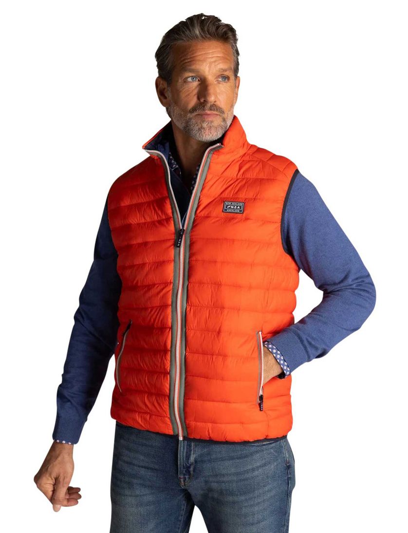 Oranje bodywarmer New Zealand waterafstotend en gewatteerd