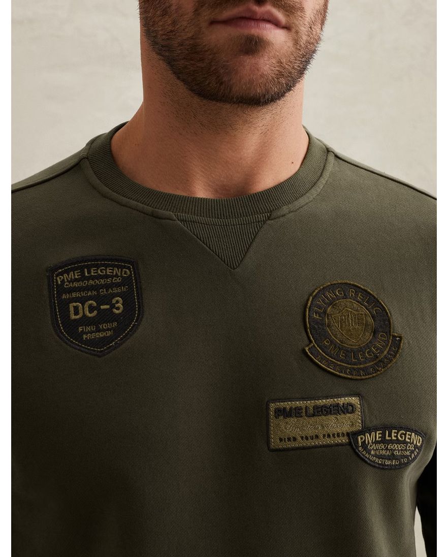 Donkergroene sweater PME Legend embleempjes