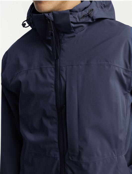 Tenson regenjas donkerblauw met borstzak en capuchon